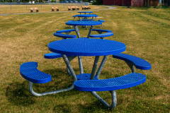 Blue Tables And Tan Benches