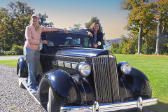 Two Ladies Pose On A Packard