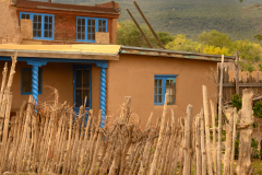 Adobe House With Blue Trim